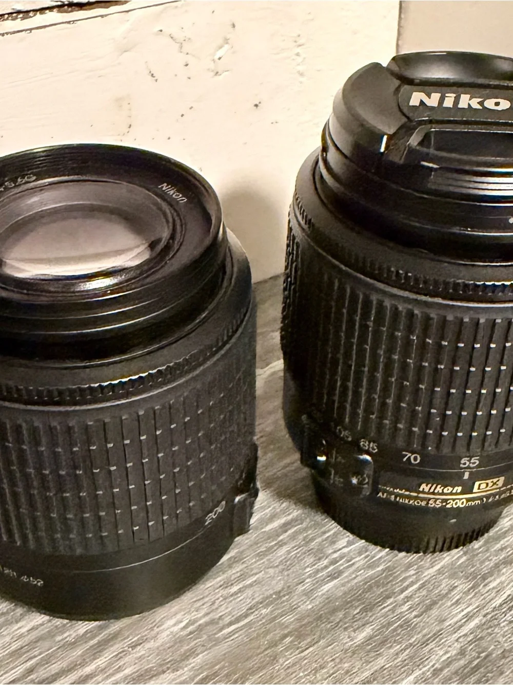 Nikon Camera Kit with Black Lenses and Red Strap